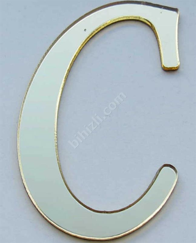 C harfi (altın renk)